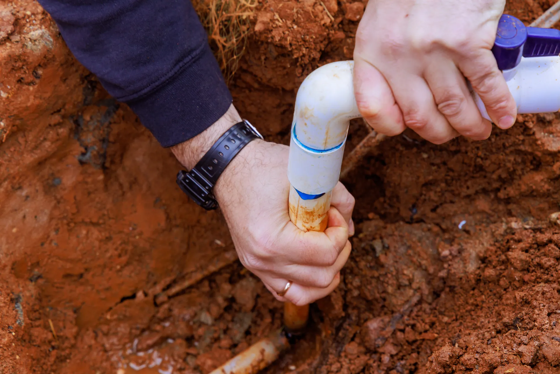 A man repairing leak pipe in apache junction, AZ